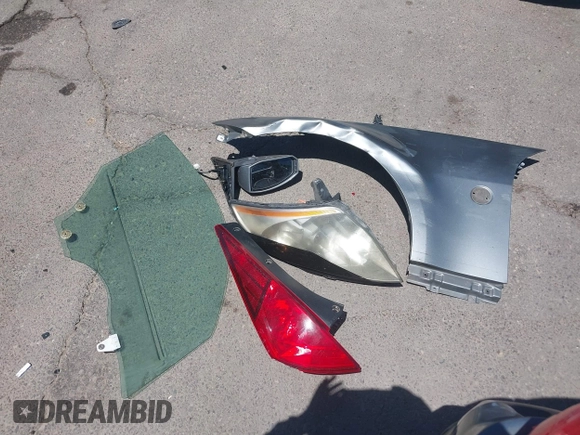 2004 Nissan 350Z Enthusiast z VIN JN1AZ34D74T164233, wystawiony jako IAAI lot #42509421 z przebiegiem 90 780 mil mil oraz . Historia ofert i sprzedaży dostępna na DreamBid. Obrazek 12.