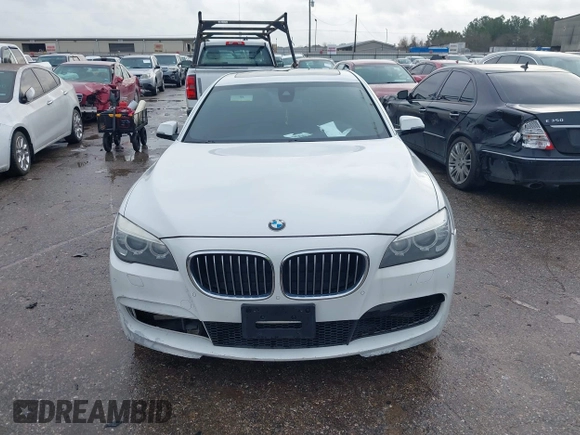 2015 BMW 7 Series 740Li with VIN WBAYE4C54FD947205, listed as a IAAI auction lot 41566291 with 172,729 mi miles and . Bid and sale history available at DreamBid. Image 12.