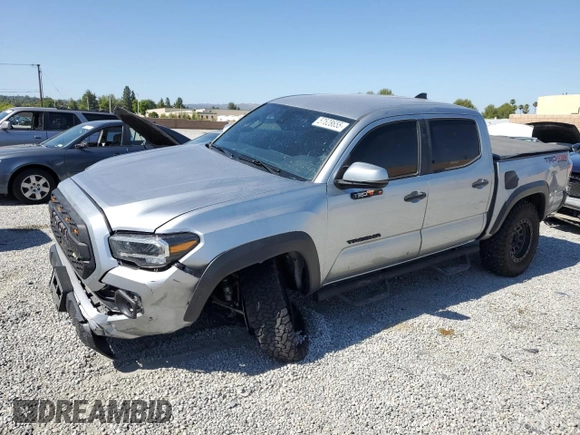 2023 Toyota Tacoma SR with VIN 3TMCZ5AN8PM545588, listed as a Copart auction lot 57528655 with 73,286 mi miles and Salvage title. Bid and sale history available at DreamBid. Image 1.