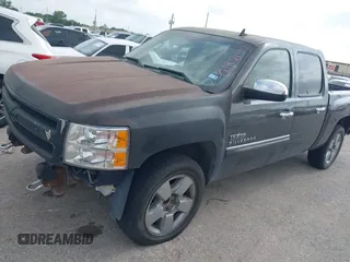 2011 Chevrolet Silverado 1500 LT with VIN 3GCPCSE09BG146325, listed as a IAAI auction lot 42182190 with 150,397 mi miles and . Bid and sale history available at DreamBid. Image 2.