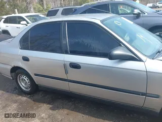 1996 Honda Civic DX with VIN 2HGEJ6627TH550103, listed as a IAAI auction lot 41710877 with 142,608 mi miles. Bid and sale history available at carsss.com. Image 13.
