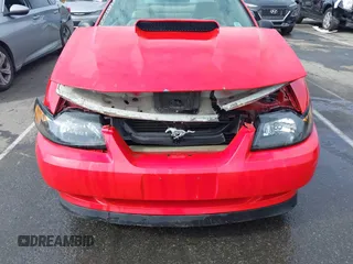 2002 Ford Mustang GT Deluxe z VIN 1FAFP42X32F161388, wystawiony jako IAAI lot #42271266 z przebiegiem 140 821 mil mil oraz . Historia ofert i sprzedaży dostępna na DreamBid. Obrazek 6.