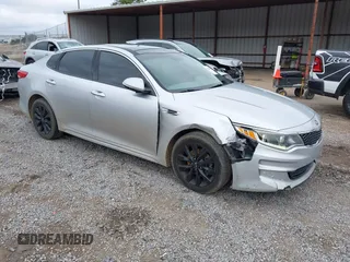 2016 Kia Optima EX z VIN 5XXGU4L36GG070336, wystawiony jako IAAI lot #41259692 z przebiegiem 124 807 mil mil oraz . Historia ofert i sprzedaży dostępna na DreamBid. Obrazek 1.