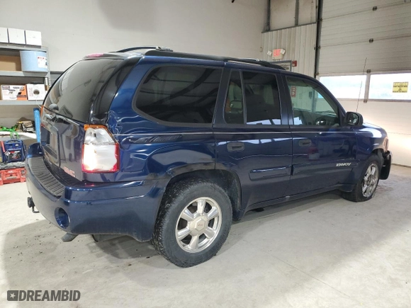 2004 GMC Envoy SLE with VIN 1GKDT13S942302025, listed as a Copart auction lot 84174174 with NaN miles and Salvage Title. Bid and sale history available at carsss.com. Image 3.