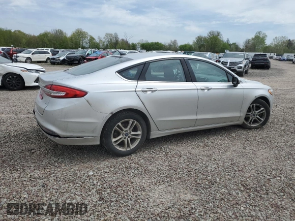 2018 Ford Fusion SE z VIN 3FA6P0H74JR112086, wystawiony jako Copart lot #56630275 z przebiegiem 123 300 mil mil oraz Szkoda całkowita • Salvage title. Historia ofert i sprzedaży dostępna na DreamBid. Obrazek 3.