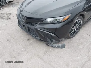 2023 Toyota Camry SE with VIN 4T1G11AK7PU123665, listed as a IAAI auction lot 41142628 with 67,294 mi miles and . Bid and sale history available at DreamBid. Image 6.