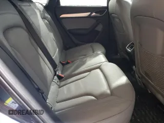 2017 Audi Q3 Premium Plus z VIN WA1JCCFS1HR005828, wystawiony jako Copart lot #86447374 z przebiegiem Nie podano mil oraz Tytuł czysty. Historia ofert i sprzedaży dostępna na DreamBid. Obrazek 11.