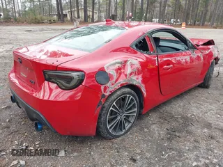 2015 Scion FR-S z VIN JF1ZNAA10F9711357, wystawiony jako IAAI lot #41225577 z przebiegiem 129 747 mil mil oraz . Historia ofert i sprzedaży dostępna na DreamBid. Obrazek 4.