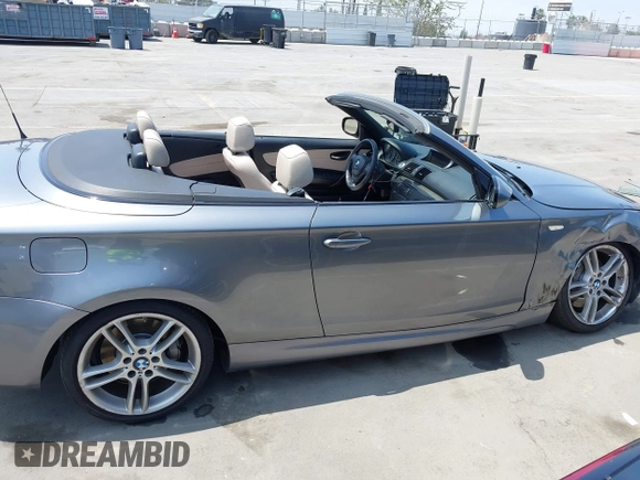 2012 BMW 1 Series 135i with VIN WBAUN7C58CVM26705, listed as a IAAI auction lot 42505448 with 72,336 mi miles and . Bid and sale history available at DreamBid. Image 13.