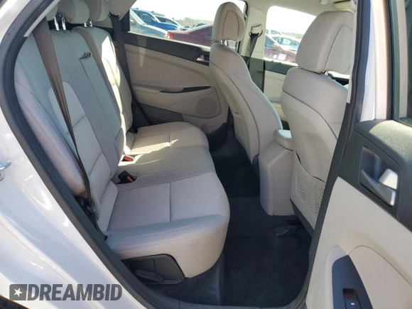 2018 Hyundai Tucson SEL z VIN KM8J33A41JU656096, wystawiony jako Copart lot #47367835 z przebiegiem 96 498 mil mil oraz Szkoda całkowita • Salvage title. Historia ofert i sprzedaży dostępna na DreamBid. Obrazek 10.