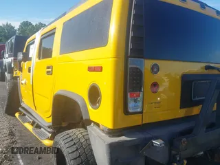 2004 Hummer H2 z VIN 5GRGN23UX4H118685, wystawiony jako IAAI lot #41790000 z przebiegiem Nie podano mil oraz . Historia ofert i sprzedaży dostępna na DreamBid. Obrazek 3.