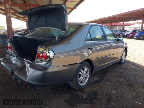 2006 Toyota Camry LE z VIN 4T1BF32K86U635925, wystawiony jako IAAI lot #42267547 z przebiegiem 162 593 mil mil oraz . Historia ofert i sprzedaży dostępna na DreamBid. Obrazek 4.