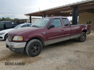2003 Ford F-150 XL with VIN 1FTRX17L63NA96989, listed as a Copart auction lot 51501945 with 297,669 mi miles and Salvage Title. Bid and sale history available at carsss.com. Image 1.
