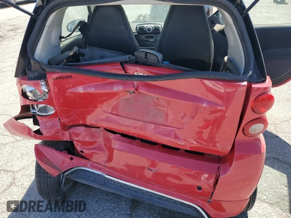 2014 Smart fortwo Pure z VIN WMEEJ3BA6EK745679, wystawiony jako Copart lot #56242784 z przebiegiem 86 991 mil mil oraz Szkoda całkowita • Salvage title. Historia ofert i sprzedaży dostępna na DreamBid. Obrazek 10.