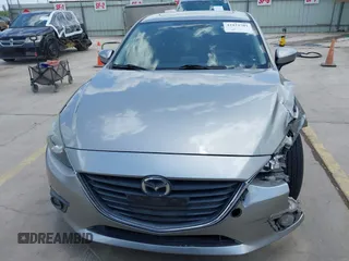 2015 Mazda 3 i Touring z VIN 3MZBM1V73FM144587, wystawiony jako IAAI lot #42422701 z przebiegiem 130 483 mil mil oraz . Historia ofert i sprzedaży dostępna na DreamBid. Obrazek 13.