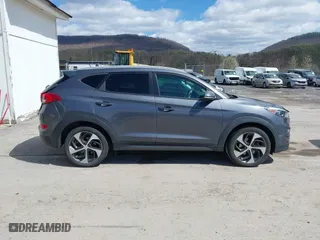 2016 Hyundai Tucson Sport with VIN KM8J33A2XGU022633, listed as a IAAI auction lot 41990348 with 73,395 mi miles. Bid and sale history available at carsss.com. Image 14.