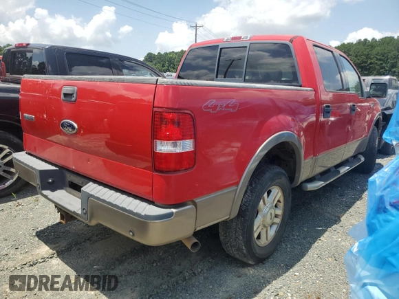 2004 Ford F-150 XLT with VIN 1FTPW14504KD65703, listed as a Copart auction lot 58792215 with 303,083 mi miles and Salvage title. Bid and sale history available at DreamBid. Image 3.