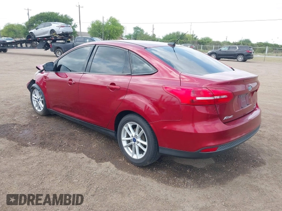 2015 Ford Focus SE with VIN 1FADP3F24FL323536, listed as a IAAI auction lot 41876148 with 221,050 mi miles. Bid and sale history available at carsss.com. Image 3.