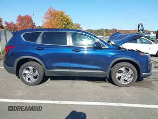 2023 Hyundai Santa Fe SE z VIN 5NMS1DAJ0PH552080, wystawiony jako IAAI lot #40653004 z przebiegiem 5 982 mil mil oraz . Historia ofert i sprzedaży dostępna na DreamBid. Obrazek 13.