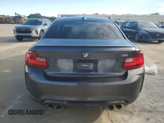 2016 BMW M2 z VIN WBS1H9C52GV786091, wystawiony jako Copart lot #73875914 z przebiegiem Nie podano mil oraz Szkoda całkowita • Salvage title. Historia ofert i sprzedaży dostępna na DreamBid. Obrazek 6.
