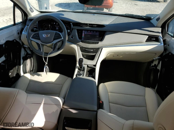 2023 Cadillac XT5 AWD Premium Luxury with VIN 1GYKNDRS8PZ135295, listed as a Copart auction lot 47783265 with 7,072 mi miles and Non Repairable. Bid and sale history available at carsss.com. Image 8.