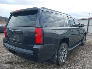 2015 Chevrolet Suburban LT with VIN 1GNSKJKC8FR717435, listed as a IAAI auction lot 41313726 with 120,731 mi miles and . Bid and sale history available at DreamBid. Image 4.