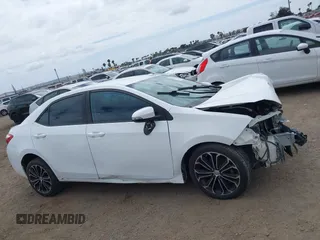 2014 Toyota Corolla L with VIN 5YFBURHE2EP085339, listed as a IAAI auction lot 42121009 with 122,339 mi miles and . Bid and sale history available at DreamBid. Image 14.