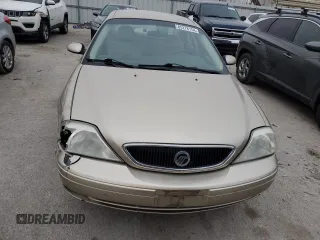 2001 Mercury Sable LS Premium with VIN 1MEFM55S61G639738, listed as a Copart auction lot 85276154 with 137,887 mi miles and Salvage Title. Bid and sale history available at DreamBid. Image 5.