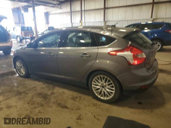 2014 Ford Focus Titanium z VIN 1FADP3N27EL462950, wystawiony jako Copart lot #65207155 z przebiegiem 34 058 mil mil oraz Szkoda całkowita • Salvage title. Historia ofert i sprzedaży dostępna na DreamBid. Obrazek 2.