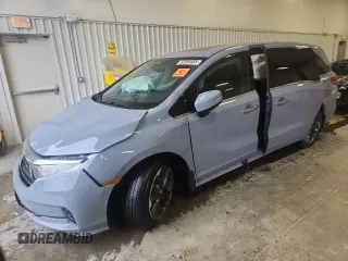 2023 Honda Odyssey Elite with VIN 5FNRL6H90PB071988, listed as a Copart auction lot 58589585 with 12,998 mi miles and Salvage title. Bid and sale history available at DreamBid. Image 1.