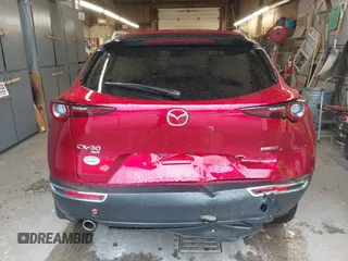 2023 Mazda CX-30 S Premium with VIN 3MVDMBDM5PM518612, listed as a IAAI auction lot 42219265 with 29,135 mi miles and . Bid and sale history available at DreamBid. Image 16.