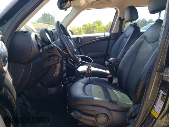 2011 MINI Countryman with VIN WMWZB3C53BWH95264, listed as a Copart auction lot 52238255 with 130,031 mi miles and Salvage Title. Bid and sale history available at DreamBid. Image 7.