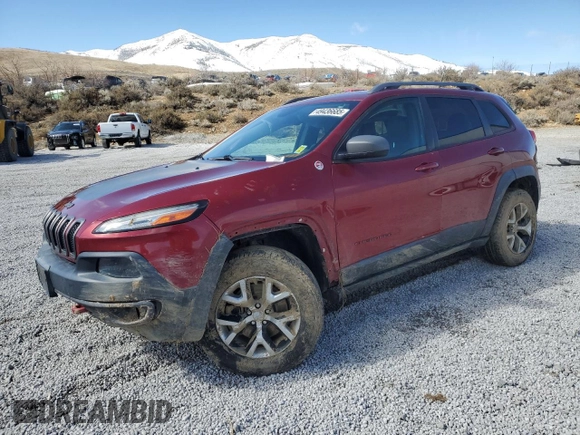 2014 Jeep Cherokee Trailhawk with VIN 1C4PJMBS7EW157305, listed as a Copart auction lot 49436685 with 138,446 mi miles and Salvage Title. Bid and sale history available at carsss.com. Image 1.