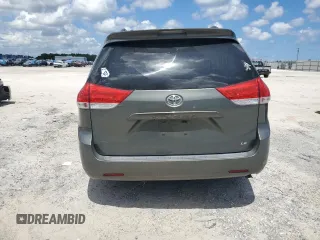 2014 Toyota Sienna LE AAS with VIN 5TDKK3DC5ES423802, listed as a Copart auction lot 69075824 with Not Provided miles and Salvage Title. Bid and sale history available at DreamBid. Image 6.
