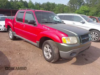 2005 Ford Explorer Sport Trac XLS z VIN 1FMZU67K95UB64672, wystawiony jako IAAI lot #42051351 z przebiegiem 209 897 mil mil oraz . Historia ofert i sprzedaży dostępna na DreamBid. Obrazek 1.