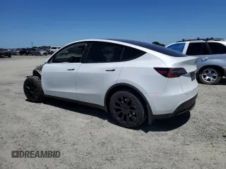 2024 Tesla Model Y Long Range with VIN 7SAYGDEE4RF054753, listed as a Copart auction lot 57989375 with 21,394 mi miles and Salvage title. Bid and sale history available at DreamBid. Image 2.