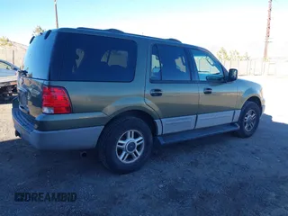 2003 Ford Expedition XLT with VIN 1FMFU16W93LB08888, listed as a IAAI auction lot 41290047 with 220,561 mi miles. Bid and sale history available at carsss.com. Image 4.