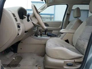2005 Ford Escape XLT with VIN 1FMYU03125KA50658, listed as a Copart auction lot 51010405 with 194,285 mi miles and Salvage Title. Bid and sale history available at carsss.com. Image 7.