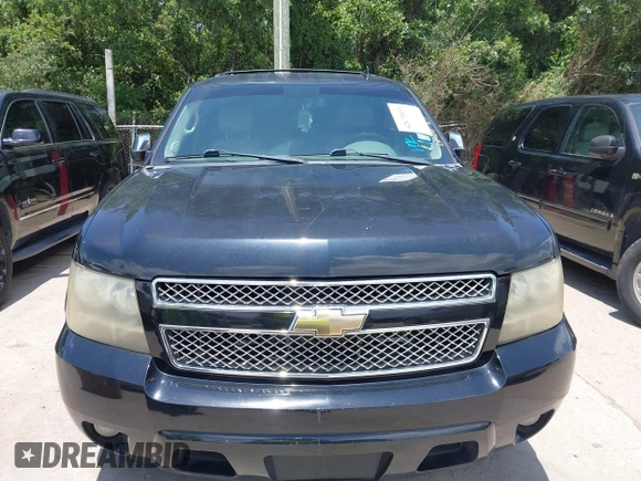 2011 Chevrolet Tahoe LT with VIN 1GNSCBE01BR389984, listed as a IAAI auction lot 42673033 with 289,294 mi miles and . Bid and sale history available at DreamBid. Image 12.