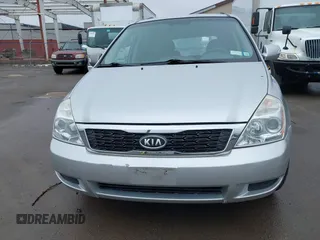 2012 Kia Sedona LX with VIN KNDMG4C72C6485952, listed as a IAAI auction lot 42029147 with 129,296 mi miles. Bid and sale history available at carsss.com. Image 12.