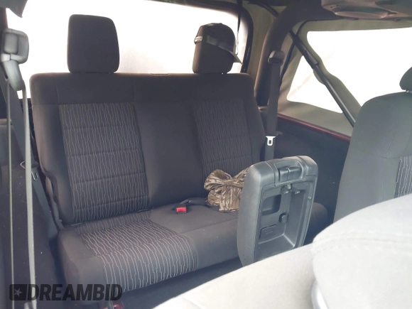2012 Jeep Wrangler Sport with VIN 1C4AJWAG9CL203018, listed as a IAAI auction lot 42377899 with Not provided miles and . Bid and sale history available at DreamBid. Image 8.