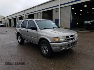 2004 Isuzu Rodeo S z VIN 4S2CK58W144306785, wystawiony jako Copart lot #85124684 z przebiegiem 296 433 mil mil oraz Szkody całkowita. Historia ofert i sprzedaży dostępna na DreamBid. Obrazek 12.