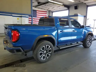 2024 GMC Canyon 4WD AT4 with VIN 1GTP6DEK3R1114273, listed as a Copart auction lot 71103464 with 5,549 mi miles and Salvage Title. Bid and sale history available at carsss.com. Image 3.