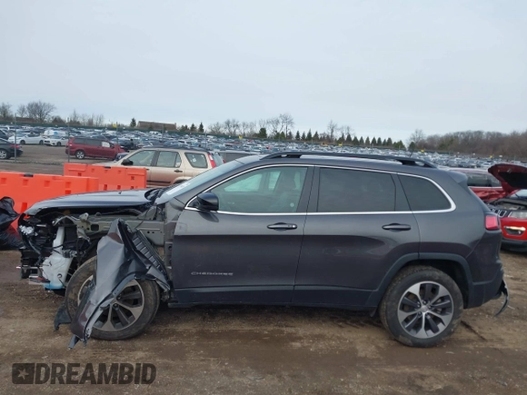 2022 Jeep Cherokee Limited with VIN 1C4PJMDX2ND501286, listed as a IAAI auction lot 41196619 with 54,975 mi miles and . Bid and sale history available at DreamBid. Image 14.