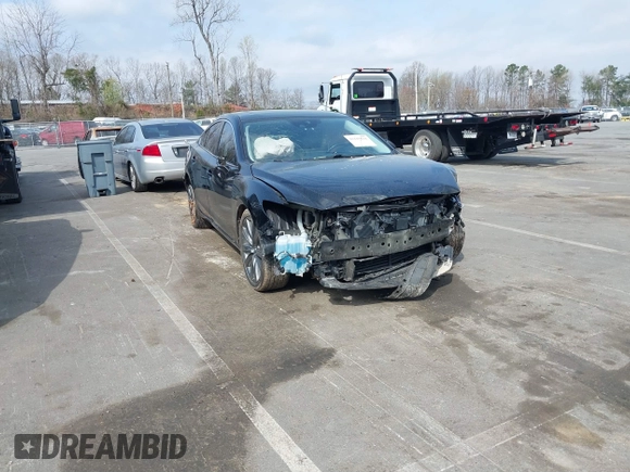 2018 Mazda 6 Touring with VIN JM1GL1VM2J1313375, listed as a IAAI auction lot 41848648 with 93,717 mi miles and . Bid and sale history available at DreamBid. Image 1.