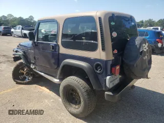 2002 Jeep Wrangler X with VIN 1J4FA39S32P735671, listed as a Copart auction lot 68236084 with 137,587 mi miles and Salvage Title. Bid and sale history available at carsss.com. Image 2.