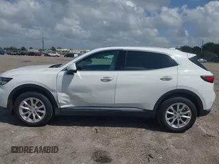 2021 Buick Envision Preferred with VIN LRBAZLR44MD073242, listed as a IAAI auction lot 41947075 with 31,335 mi miles and . Bid and sale history available at DreamBid. Image 14.