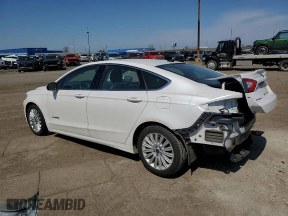 2015 Ford Fusion SE Hybrid with VIN 3FA6P0LU7FR154952, listed as a Copart auction lot 54192465 with 490,431 mi miles and Clean Title. Bid and sale history available at carsss.com. Image 2.