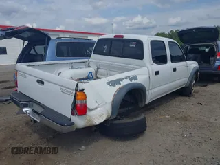 2001 Toyota Tacoma PreRunner z VIN 5TEGN92N11Z805360, wystawiony jako IAAI lot #42128006 z przebiegiem 295 381 mil mil oraz . Historia ofert i sprzedaży dostępna na DreamBid. Obrazek 4.