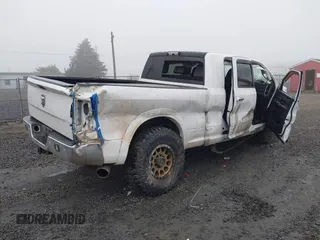 2016 Ram 2500 Laramie with VIN 3C6UR5NL2GG287071, listed as a IAAI auction lot 40989387 with 104,781 mi miles and . Bid and sale history available at DreamBid. Image 4.
